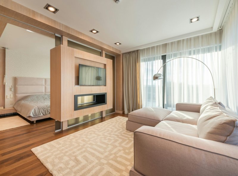 Bright and airy modern apartment interior featuring a cozy lounge area.